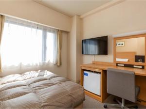 Televisyen dan/atau pusat hiburan di The OneFive Okayama - Vacation STAY 41846v
