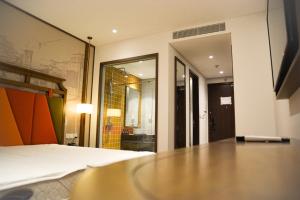 TV a/nebo společenská místnost v ubytování APEC MŨI NÉ MANDALA