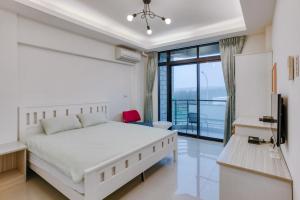 Ένα ή περισσότερα κρεβάτια σε δωμάτιο στο Le Wu Casa +9 φωτογραφίες