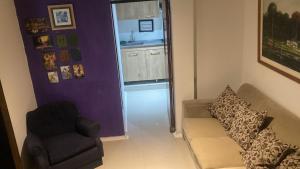 Et opholdsområde på Habitaciones La Novena DE CHIA