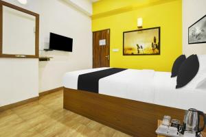 TV a/nebo společenská místnost v ubytování Super Hotel O Porvorim Near Mall De Goa