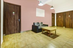 Posezení v ubytování Super Hotel O Porvorim Near Mall De Goa