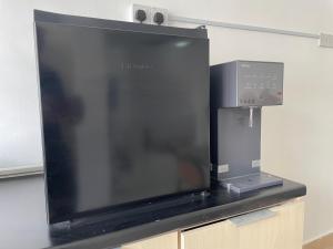 TV a/nebo společenská místnost v ubytování Lit-lit