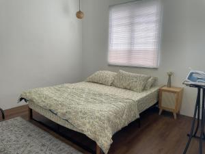 Postel nebo postele na pokoji v ubytování Lit-lit