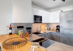 Η κουζίνα ή μικρή κουζίνα στο Apartment "Inselliebe"