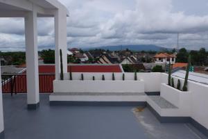a view from the balcony of a house at Cozy Dwelling in Ngaglik +7 photos