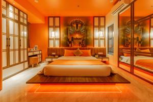 En eller flere senge i et værelse på Chiic House 8 - Khách sạn tình yêu