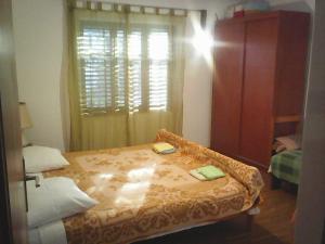 Postel nebo postele na pokoji v ubytování Apartment Len Slovaci