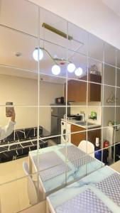 Η κουζίνα ή μικρή κουζίνα στο Victoria Suites Mactan