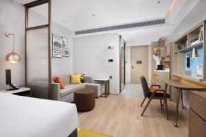 Voodi või voodid majutusasutuse Home2 Suite by Hilton Chaozhou toas