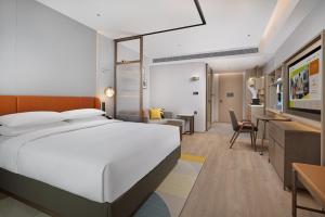 Voodi või voodid majutusasutuse Home2 Suite by Hilton Chaozhou toas