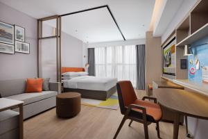 Voodi või voodid majutusasutuse Home2 Suite by Hilton Chaozhou toas