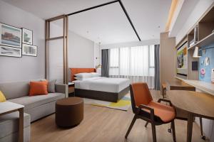 Voodi või voodid majutusasutuse Home2 Suite by Hilton Chaozhou toas