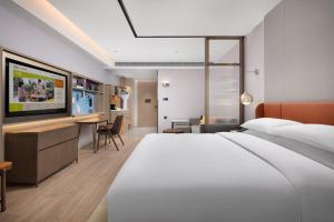 Voodi või voodid majutusasutuse Home2 Suite by Hilton Chaozhou toas