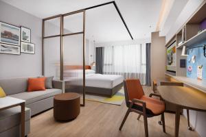 Voodi või voodid majutusasutuse Home2 Suite by Hilton Chaozhou toas