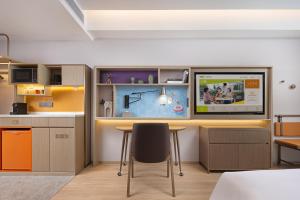 Köök või kööginurk majutusasutuses Home2 Suite by Hilton Chaozhou