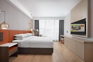 Voodi või voodid majutusasutuse Home2 Suite by Hilton Chaozhou toas