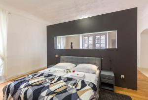 Postel nebo postele na pokoji v ubytování Zámecké apartmány Litomyšl