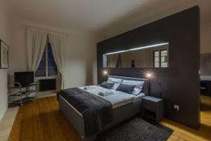Postel nebo postele na pokoji v ubytování Zámecké apartmány Litomyšl