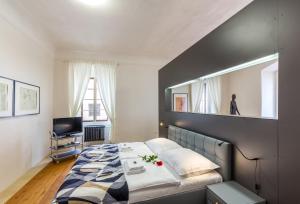 Postel nebo postele na pokoji v ubytování Zámecké apartmány Litomyšl