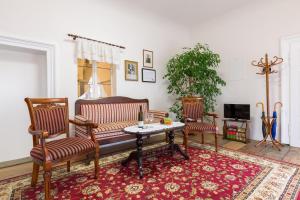 TV a/nebo společenská místnost v ubytování Zámecké apartmány Litomyšl