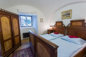 Postel nebo postele na pokoji v ubytování Zámecké apartmány Litomyšl