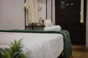 Postel nebo postele na pokoji v ubytování Collection O Patio Zaragoza