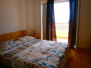 Postel nebo postele na pokoji v ubytování Apartment Ivanka
