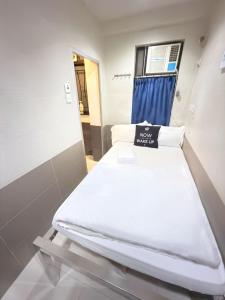Postelja oz. postelje v sobi nastanitve Apple Hostel 蘋果賓館