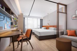 Voodi või voodid majutusasutuse Home2 Suite by Hilton Chaozhou toas