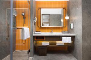 Vannituba majutusasutuses Home2 Suite by Hilton Chaozhou