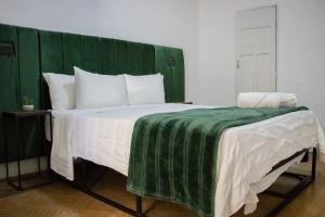 Postel nebo postele na pokoji v ubytování Collection O Patio Zaragoza