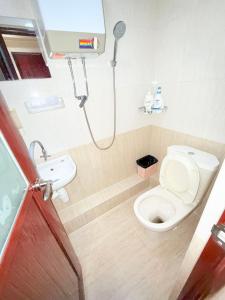 Kopalnica v nastanitvi Apple Hostel 蘋果賓館