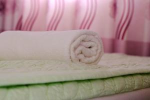 Postel nebo postele na pokoji v ubytování Lucky Hội an Hotel