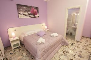 Postel nebo postele na pokoji v ubytování B&B San Domenico