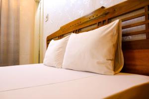 Postel nebo postele na pokoji v ubytování Lucky Hội an Hotel
