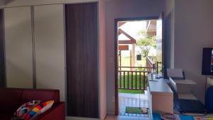 a room with a sliding glass door to a balcony at Bora Bora Temporada in Gamboa