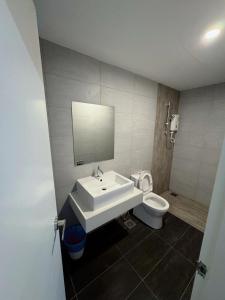 a bathroom with a sink and a toilet at Arte Plus Ampang City 7Pax-3BR-2CP in Kuala Lumpur