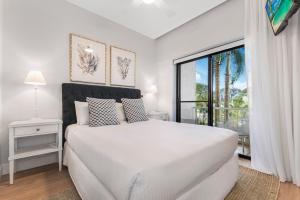 Voodi või voodid majutusasutuse Mirra Chana Beachfront Apartments Mooloolaba toas