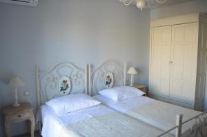 Łóżko lub łóżka w pokoju w obiekcie Salvia 4 Stars Apartment