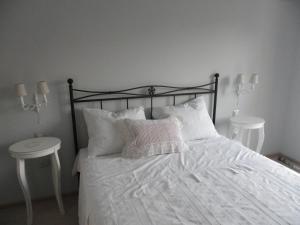 Łóżko lub łóżka w pokoju w obiekcie Salvia 4 Stars Apartment
