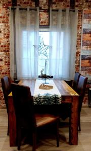 a wooden table with a star on top of it at Ramiwi am Teutoburger Wald in Oerlinghausen