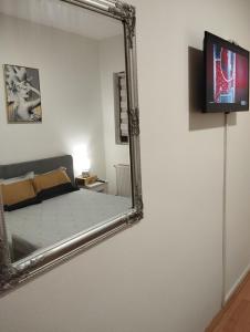 TV a/nebo společenská místnost v ubytování Apartman 053