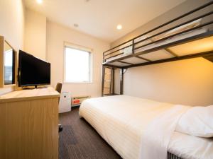 Postel nebo postele na pokoji v ubytování Super Hotel Kitami + 36 fotografií