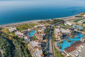 an aerial view of a resort next to the ocean at Lindos Imperial Resort & Spa in Kiotari