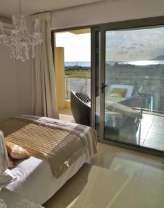 Postel nebo postele na pokoji v ubytování Lagada Resort