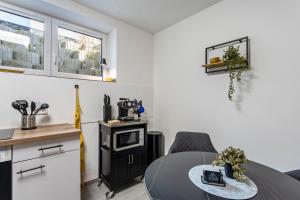 Kuchyň nebo kuchyňský kout v ubytování Tua Casa - Souterrain Appartment