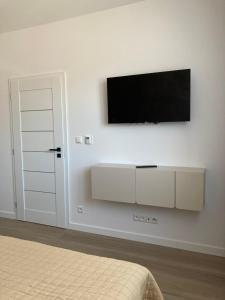 TV a/nebo společenská místnost v ubytování Panorama View II