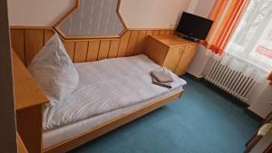 Postel nebo postele na pokoji v ubytování Gasthof HIRSCH GmbH