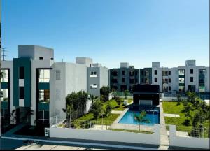 a view of a building with a swimming pool at Cristal diamante in Los Algodones